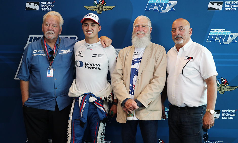 Group Photo With Turns For Troops Driver Graham Rahal.