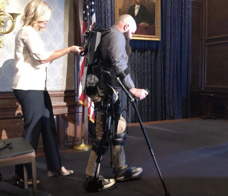 A SoldierStrong spinal cord exoskeleton in use by a wounded vet.